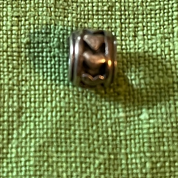 Pandora silver charm with hearts carved around the barrel, 1/4” diameter - Picture 6 of 6